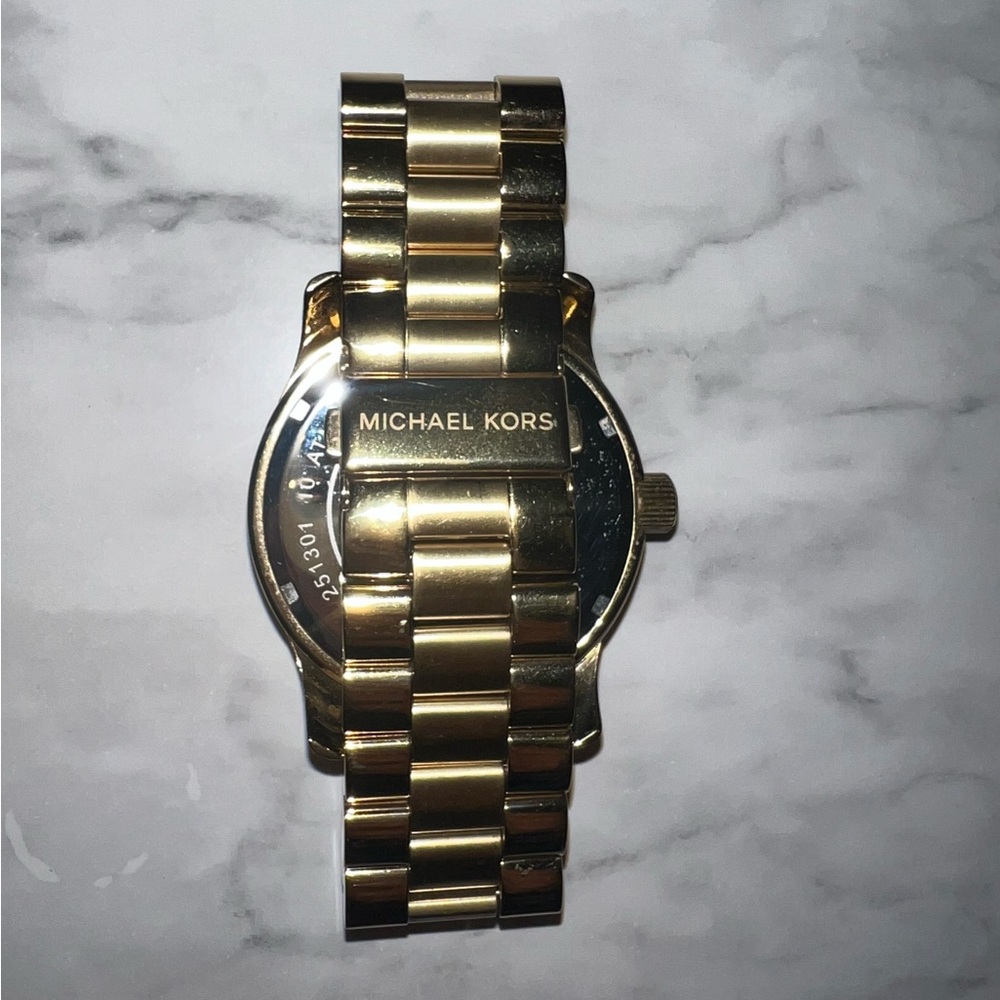 Michael Kors Oversized Gold-Tone Logo Watch - Picture 3 of 3